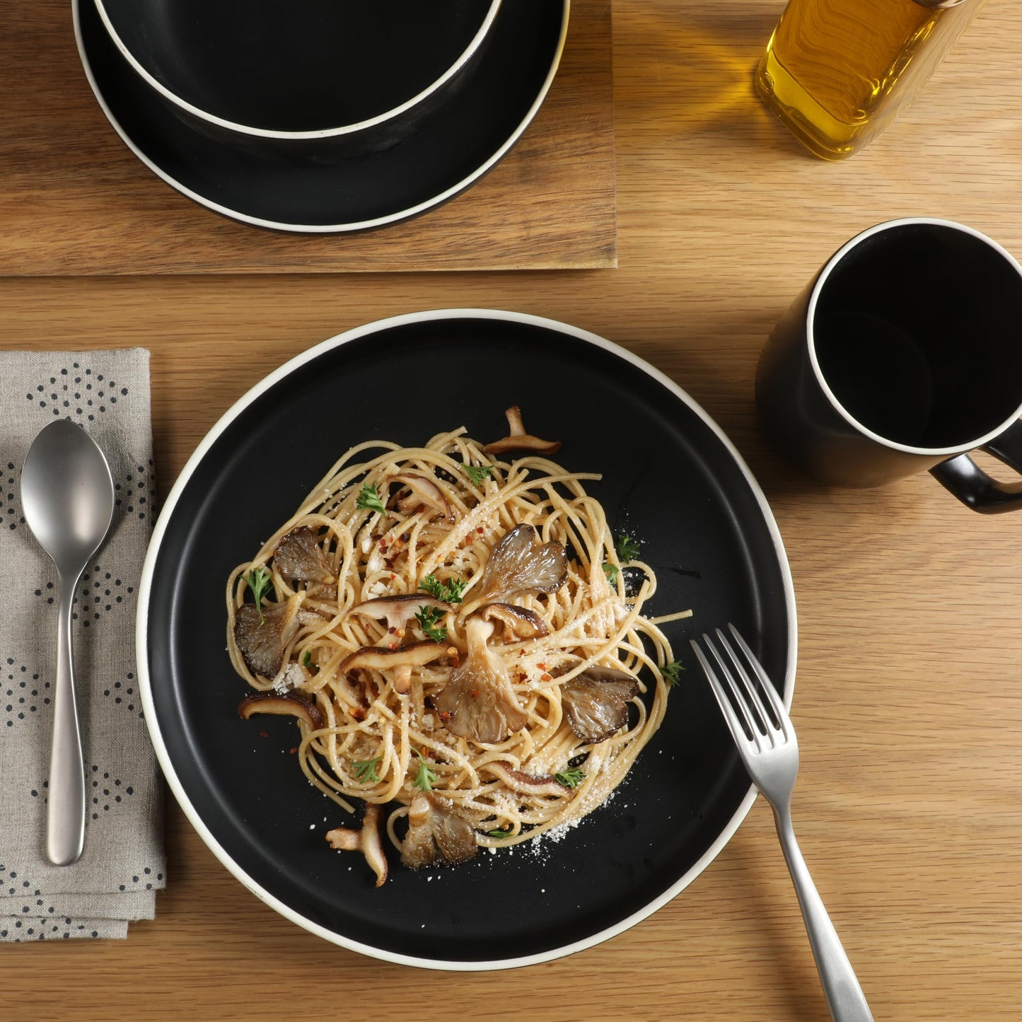 Zuma Nuevo 32 Piece Plates Bowls and Mug Dinnerware Set - Black